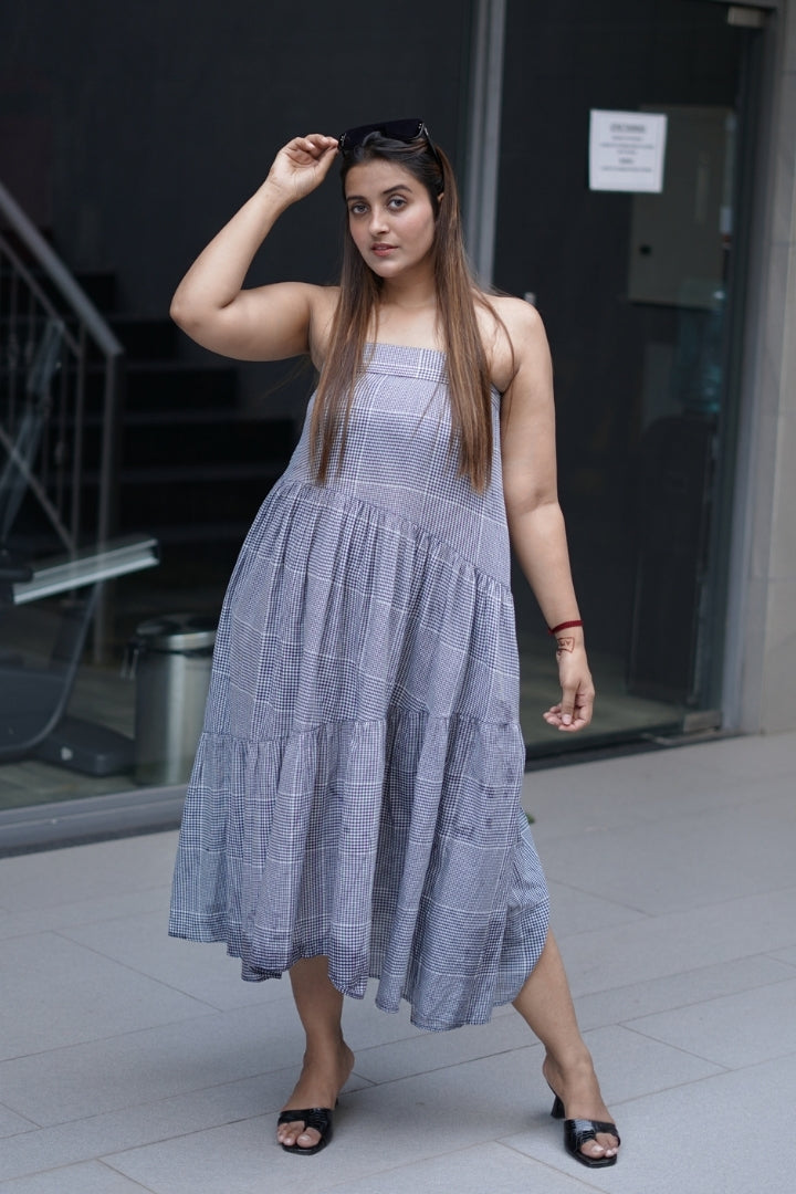 Tired dress with noodle straps