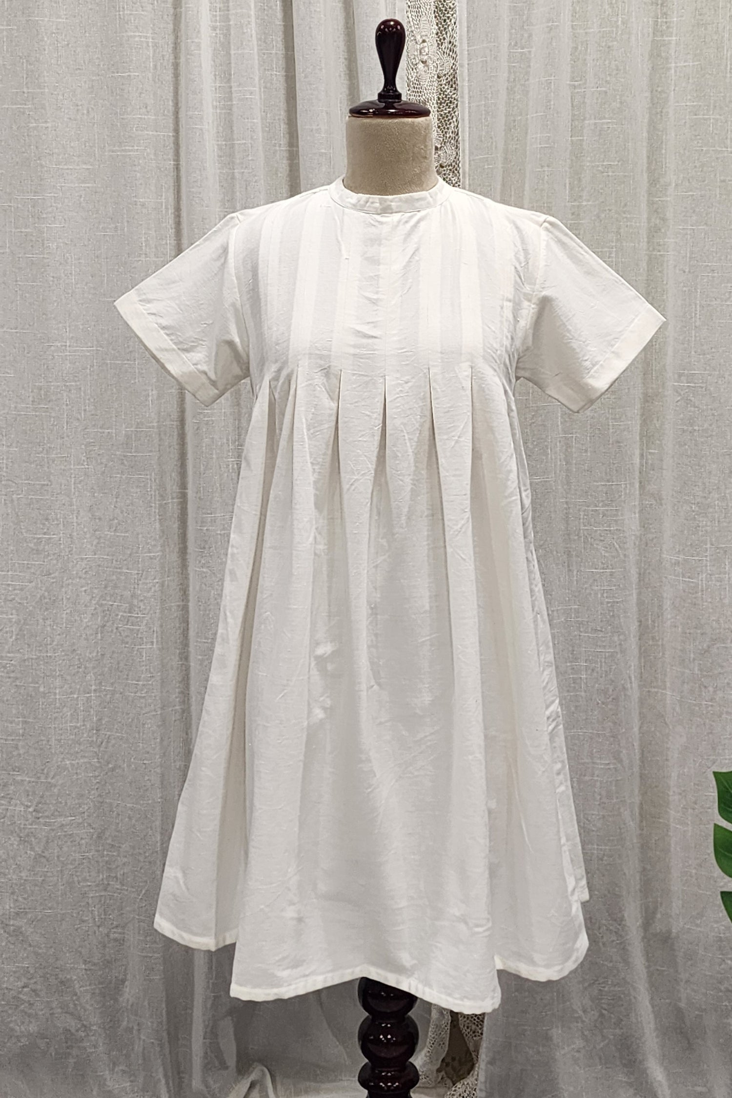 White handspun and handwoven pleated tunic