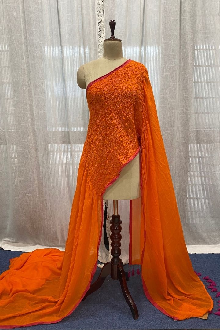 Orange Smocking Muslin Saree with Pink Border
