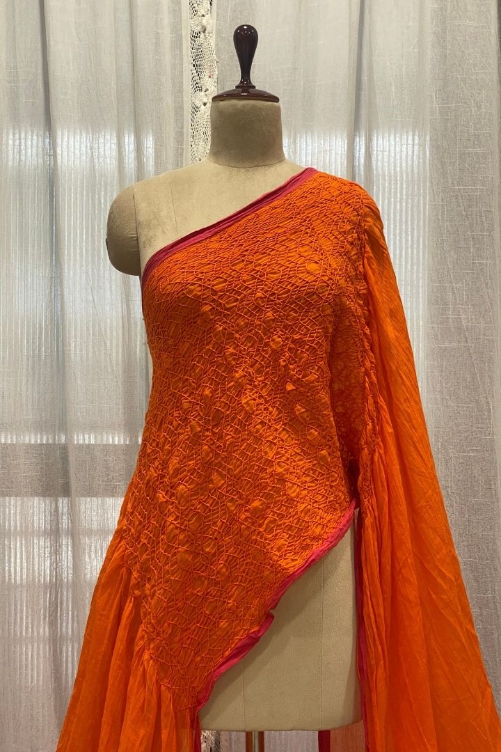 Orange Smocking Muslin Saree with Pink Border