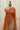 Light Orange Smocking Muslin Saree with Pink Border