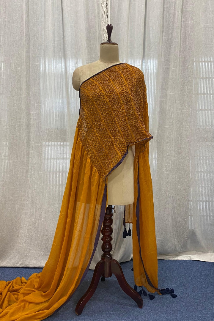 Mustard Orange Smocking Muslin Saree with Violet Border