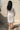 Ankara White Muslin Dress Modest silhouette Jamdani Contrast pleats - Back