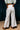 Damini Women's White Summer Trousers in Khadi with zippered slits - Back